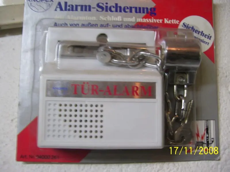 Dverný alarm so zámkom